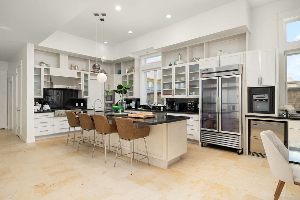 Fully stocked kitchen with extra seating for up to 4 guests