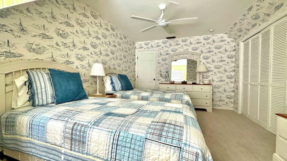 2 Twin beds, Smart TV, oversized closet.