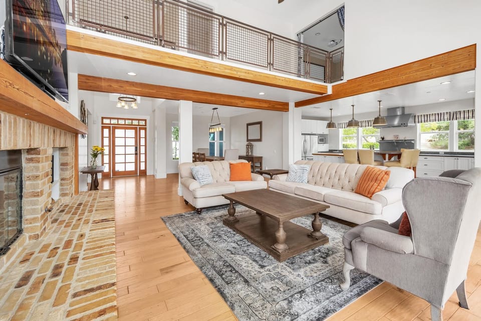 The open floorplan living room keeps everyone connected, perfect for family time, gatherings, and relaxing together.