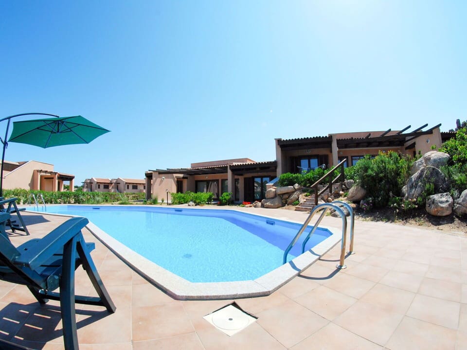 Water, Plant, Property, Sky, Swimming Pool, Building, Azure, Outdoor Furniture, Shade, Sunlounger