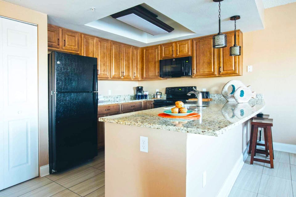 Full kitchen with all the necessities to cook a meal.