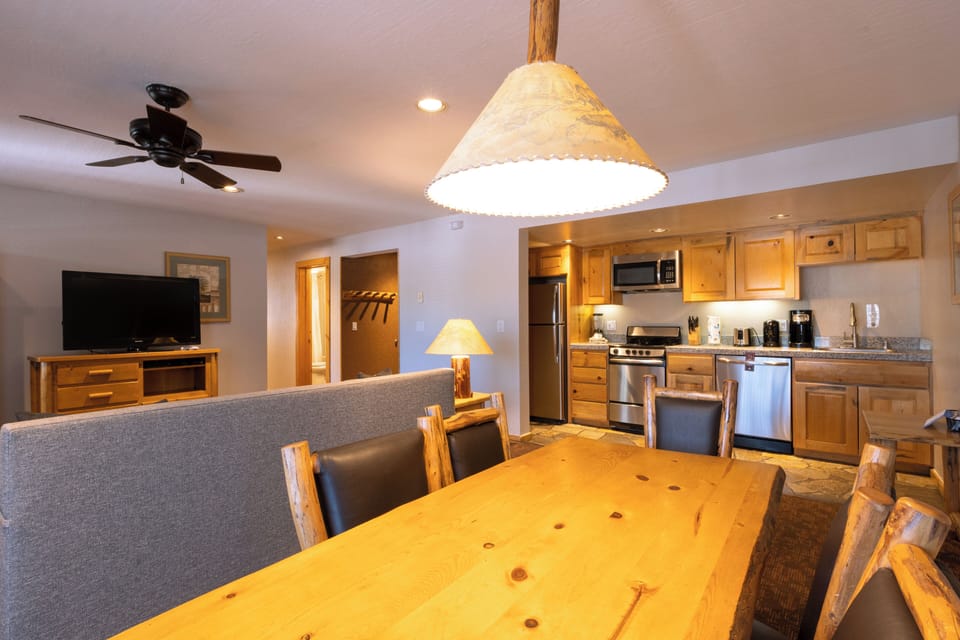 Cook together easily in this open-concept lodge kitchen.