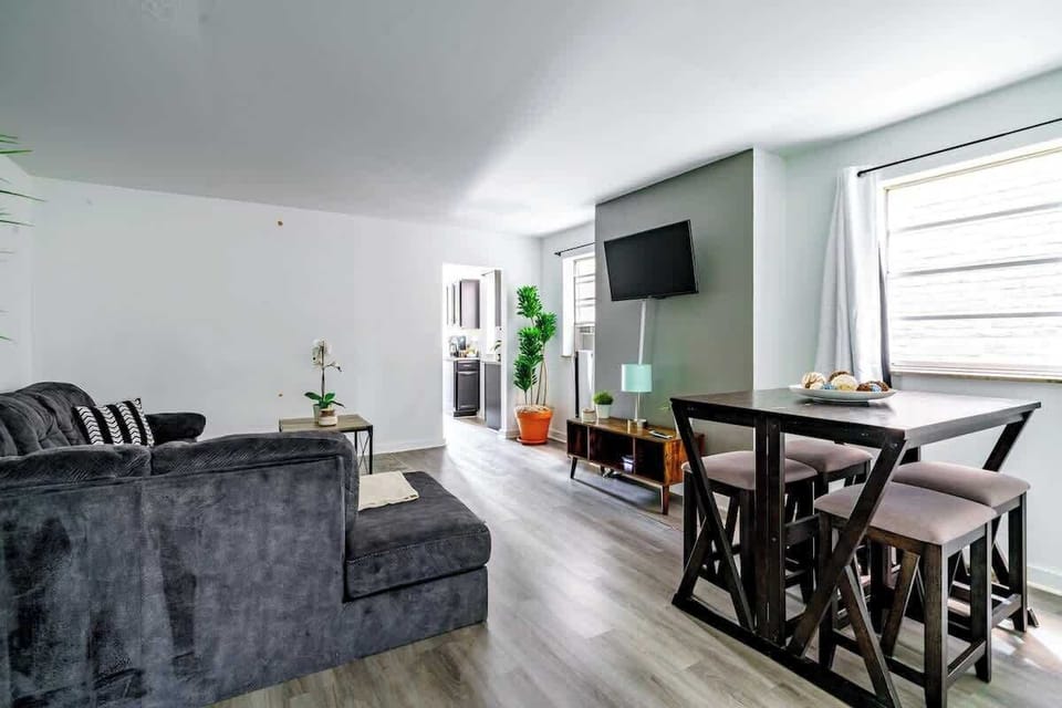 Surround yourself with lush greenery in our expansive living room. High-end fixtures, fast internet, heating & cooling, perfect create unforgettable memories