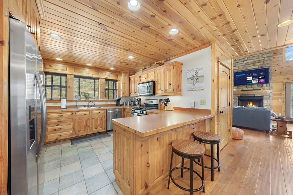 Barstool seating for two is available at the kitchen counter.