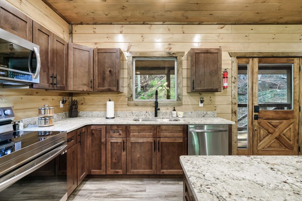 Huge Sink and Cabinets full of Cookware, Dishware, and Appliance