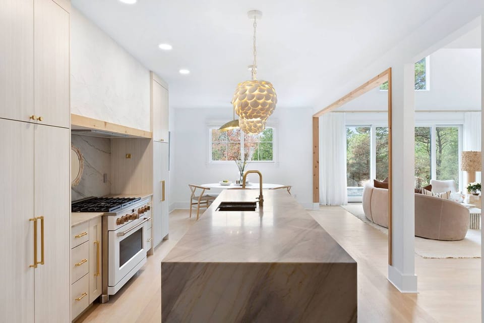 Kitchen w/ quartzite counters and custom cabinetry 