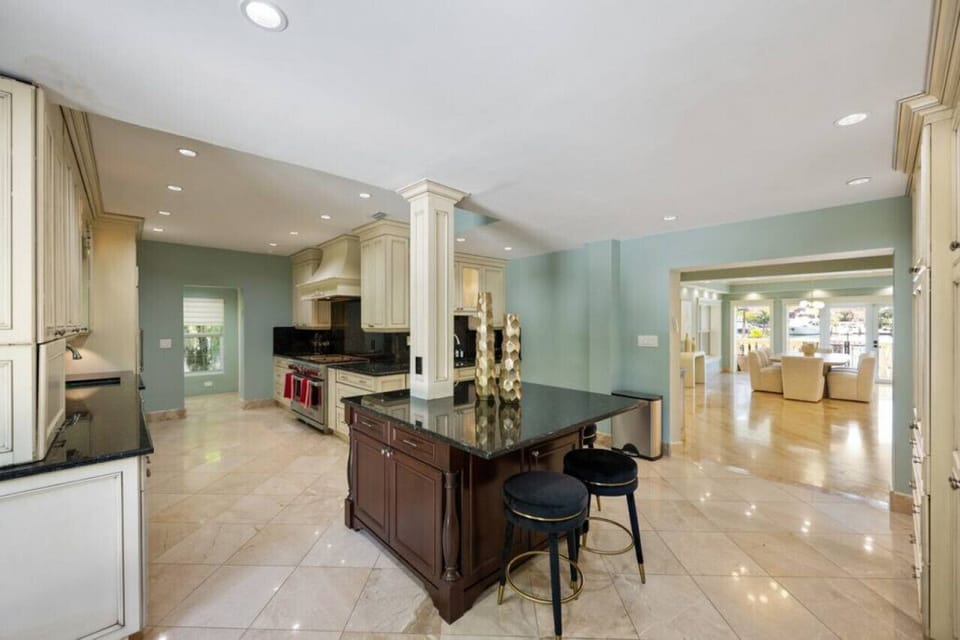 A seamless flow from the open living and dining areas leads right into the spacious kitchen.