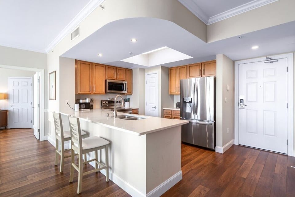 Spacious kitchen with all the comforts of home, Refrigerator with Ice Dispenser.