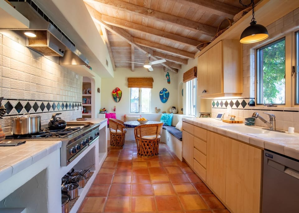 Large galley kitchen with gas cooktop