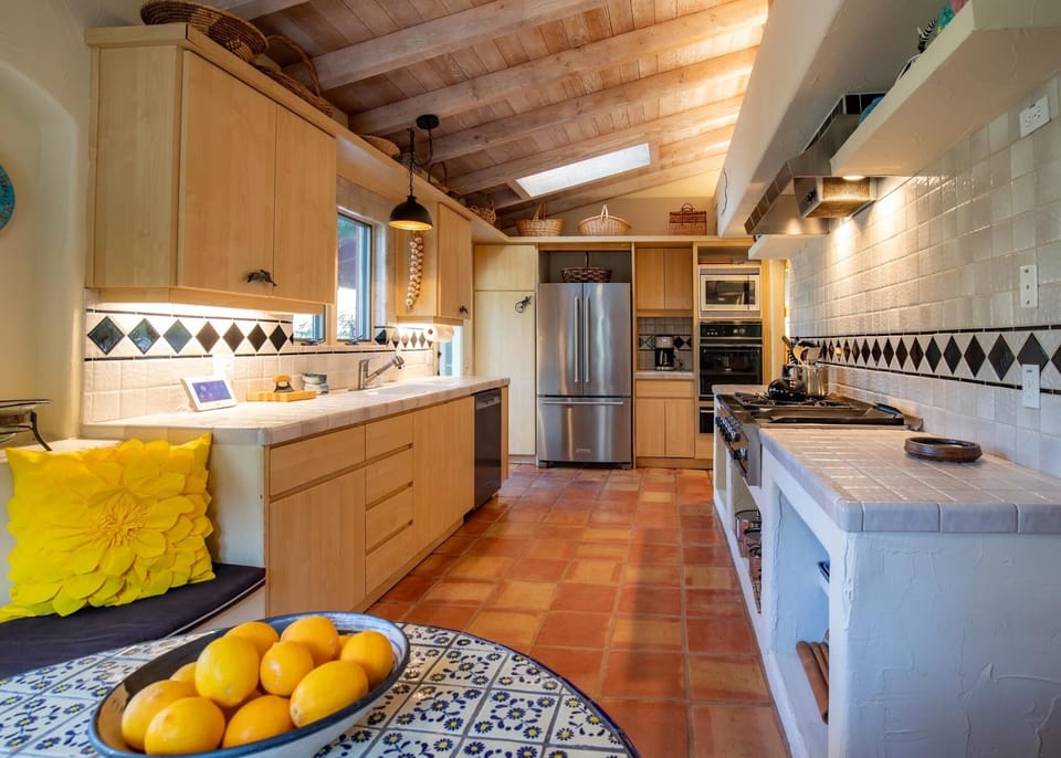 Large galley kitchen with gas cooktop