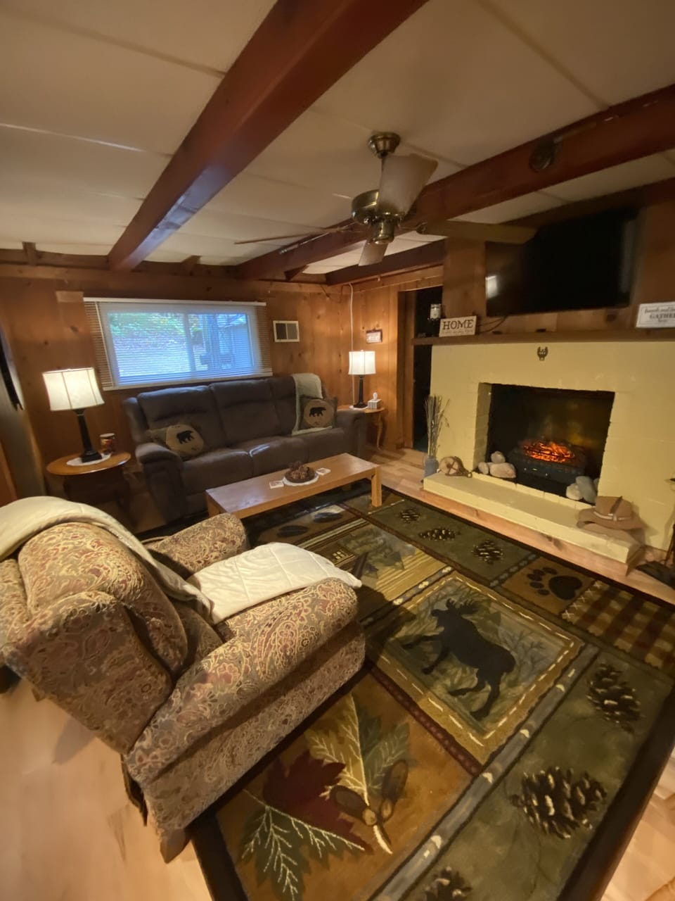 Warm, cozy with electric fireplace and big screen TV