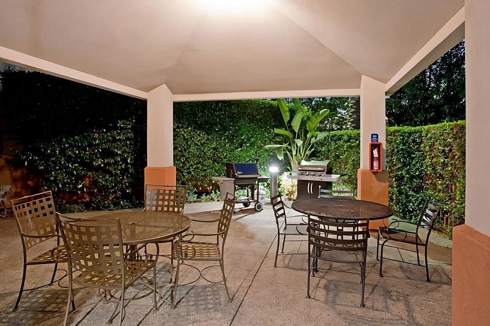 Unwind outdoors with shaded seating and an evening barbecue.
