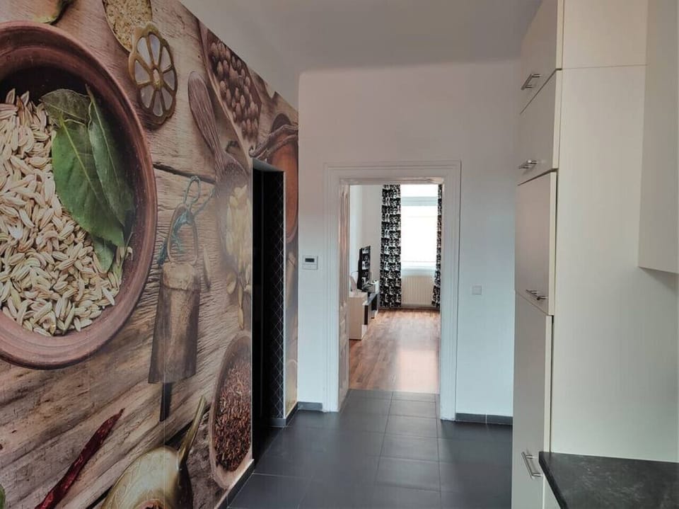 Welcome to the kitchen, where Arbio Designers have crafted a space that`s as inviting as it is efficient, perfect for cooking and socializing.