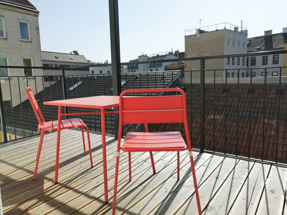 Step out onto the balcony, an outdoor oasis designed by Arbio Designers, where you can bask in the fresh air and scenic beauty.