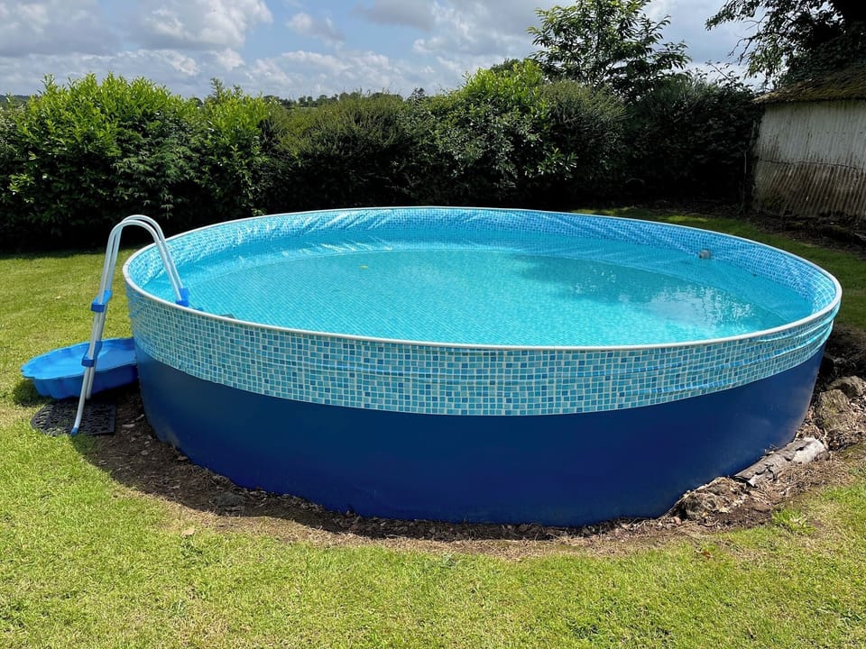 An above ground pool is available for use during the summer months