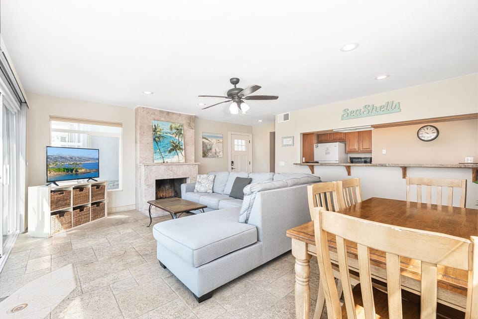 The lower unit’s dining and kitchen area blends style and convenience
                