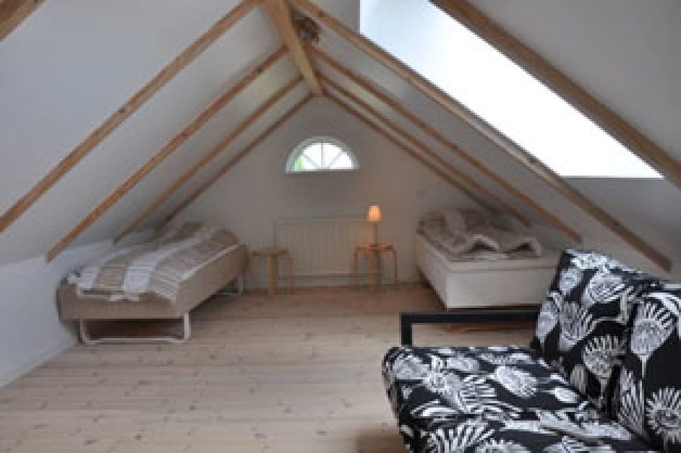 2nd floor loft bedroom with tv, dvd and space for 2 more beds if needed.