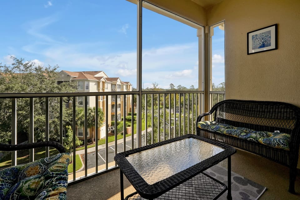 Screened in balcony..The perfect spot for morning coffee!