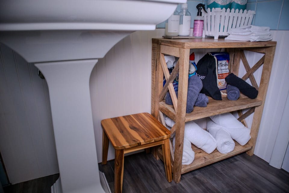 California Design Den towels — always rolled, never folded.