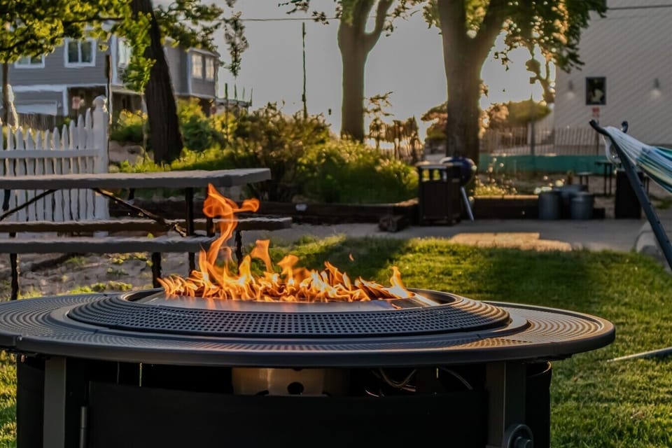 Each unit has its own private outdoor area with plenty of yard space, a propane fire pit, hammock, picnic table, and Adirondack chairs that can be moved around to suit your group.