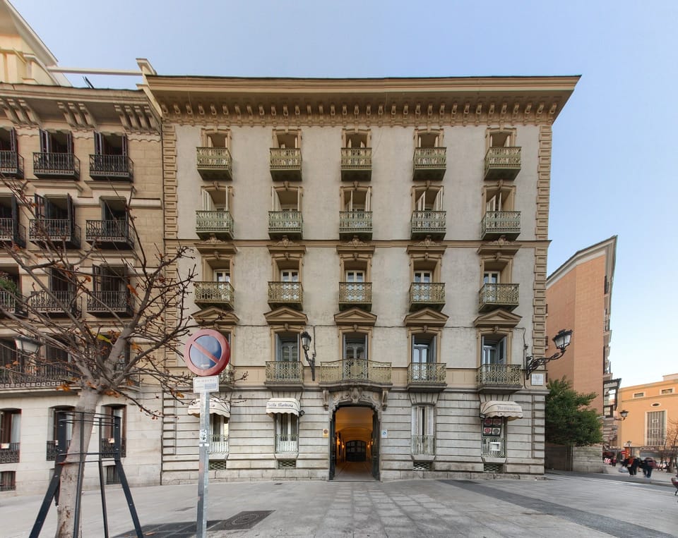 The facade of the listed building, Casa de Madrid occupies the entire second fl.