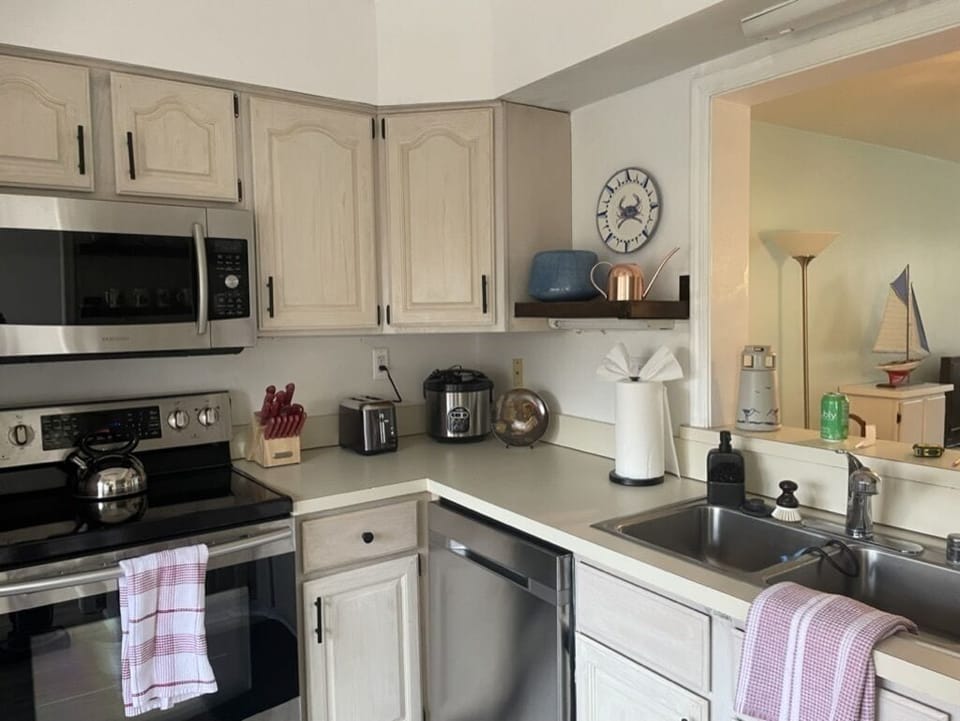 Fully stocked kitchen includes new service for 8