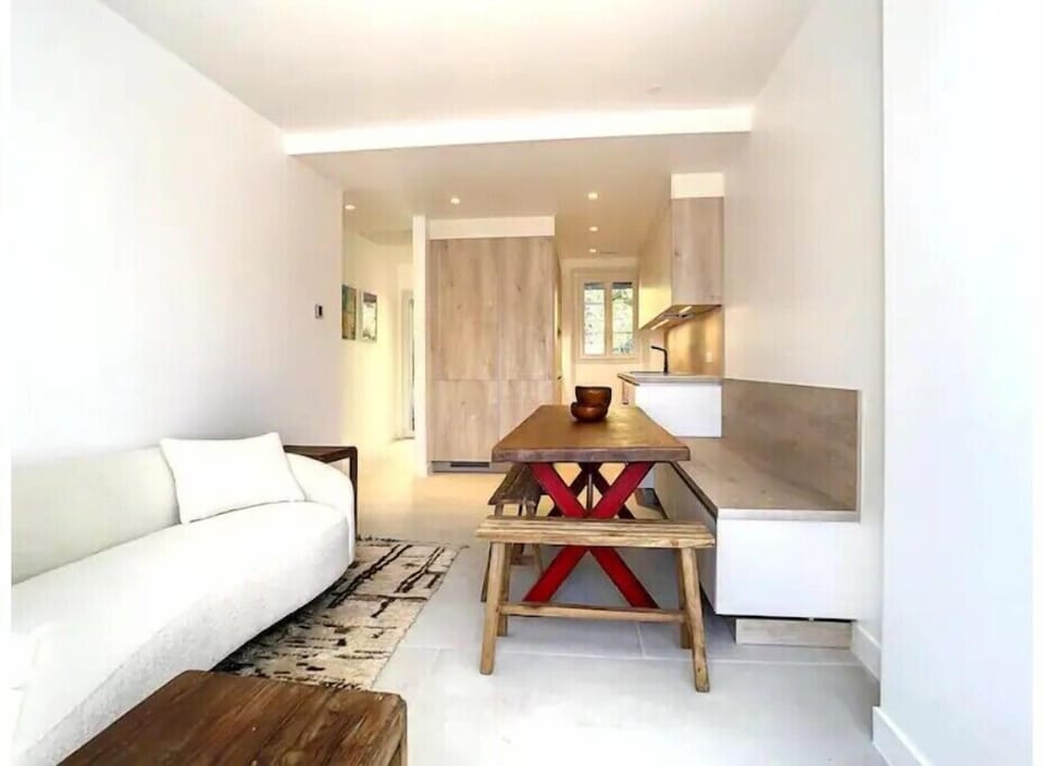 Modern and brand new kitchen (in back ground) and seating area.  