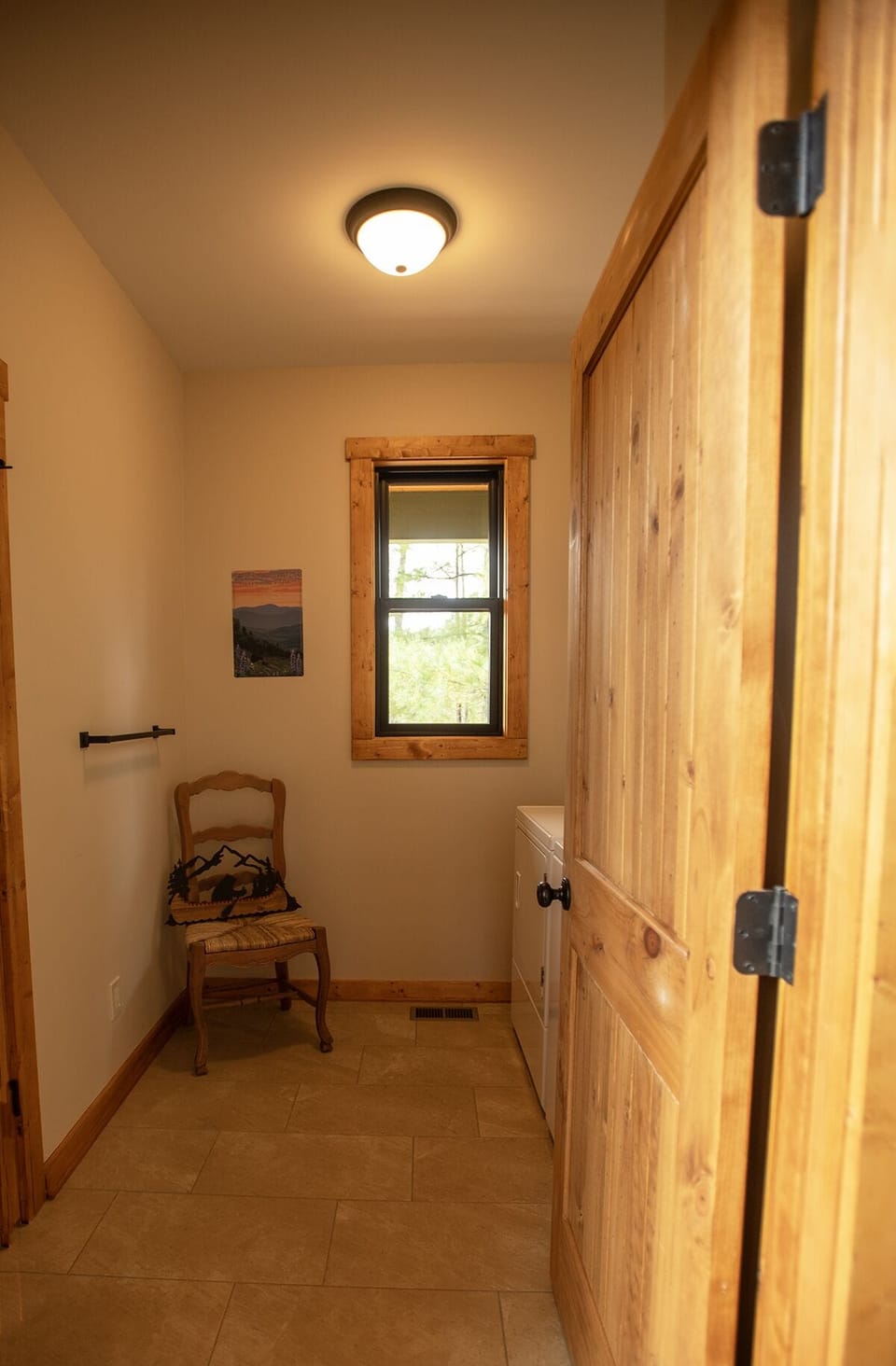 Laundry room on main with commercial sized washer & dryer.