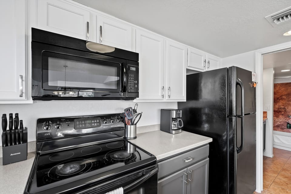 Modern kitchen with sleek appliances.
