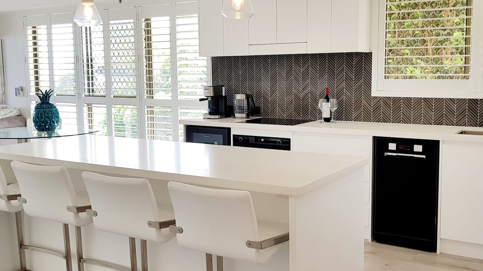 Bench seating for 4, Plantation shutters for that summer feel.