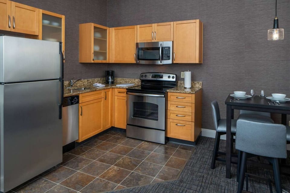 Cook easy meals in a sleek, fully equipped kitchenette.