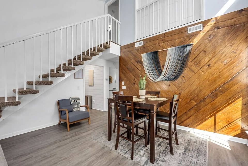 Indulge in delicious meals or engage in lively board games at the dining table, with dishes and silverware readily available in the well-equipped kitchen.