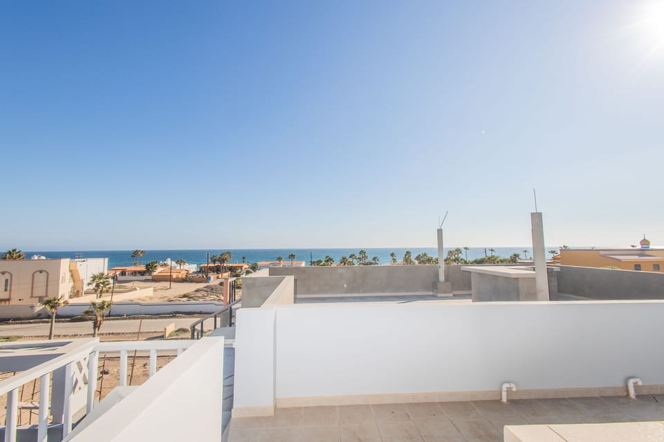 View of the ocean from the rooftop patio/outdoor kitchen.