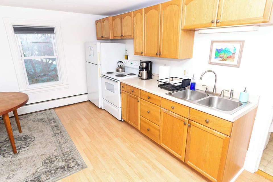The fully equipped and spotlessly clean kitchen provides everything you'll need to reheat leftovers or whip a meal before exploring more of our Brave Little State