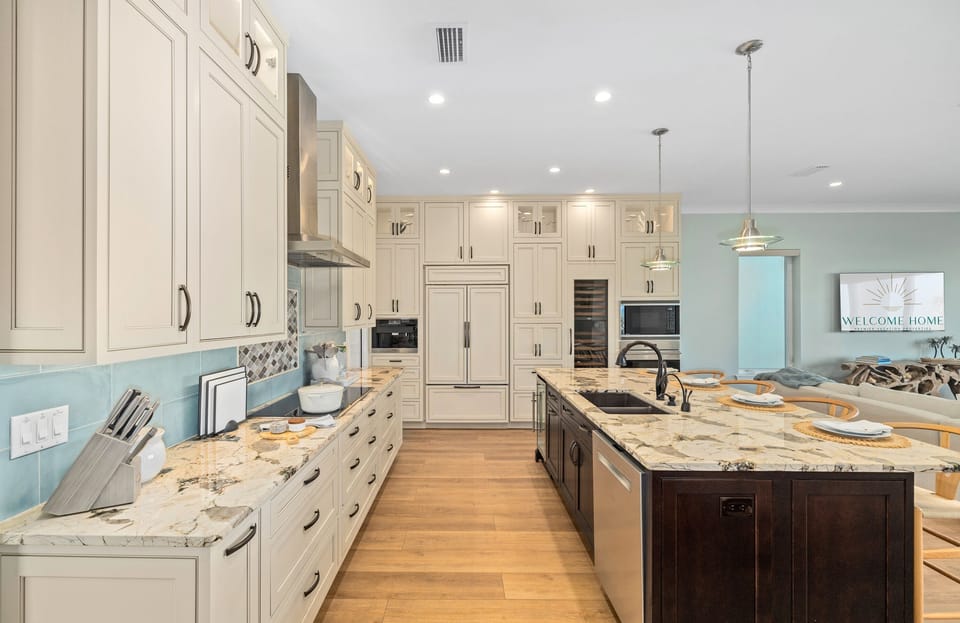 Fully stocked chef's kitchen with modern appliances and ample counter space