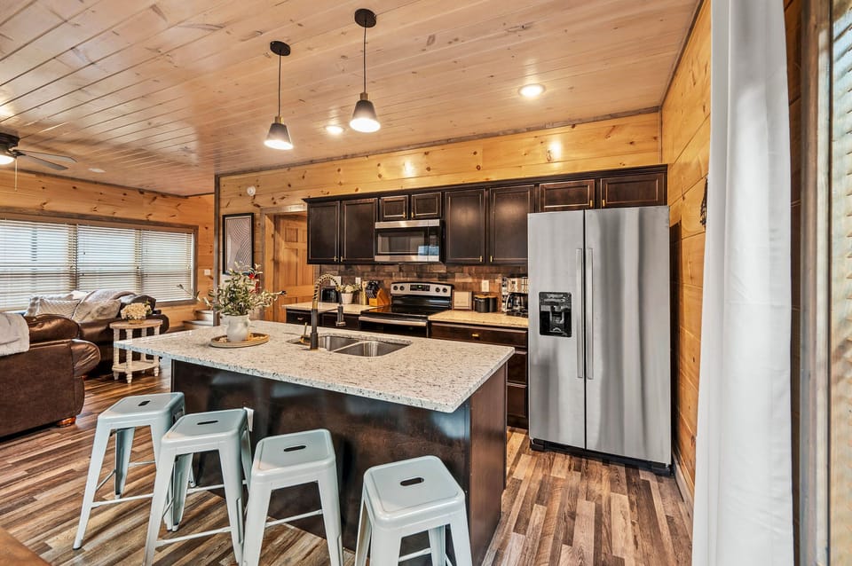 Gourmet Kitchen: Craft delectable meals in our high-end kitchen. Local Fact: Gatlinburg hosts the popular Smoky Mountain Winefest every year.