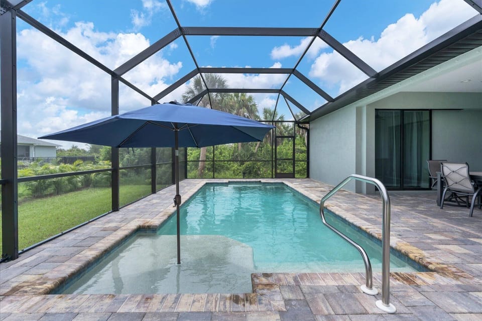 Umbrella for shade to lounge on the sun deck of the pool