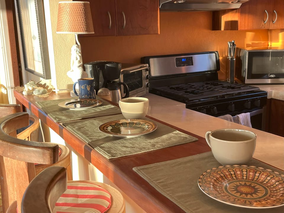 The breakfast bar offers stool seating for three.