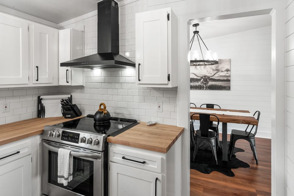 Kitchen connects to dining room and living room