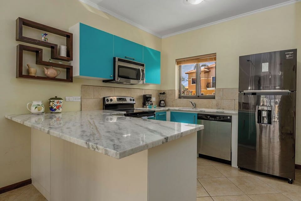 An open concept living dining room. Perfect for more social interaction among family members and friends!