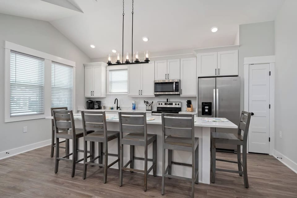 Spacious dining area with seating for family meals.