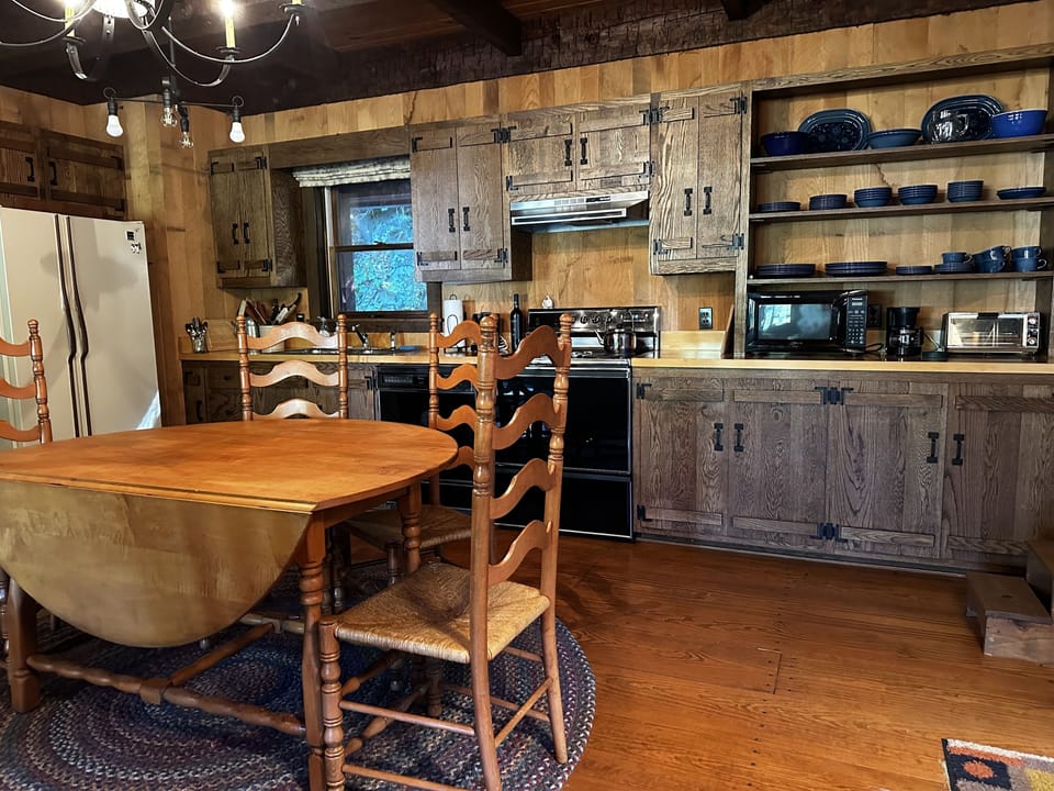 Spacious eat-in kitchen has seating for 6.
