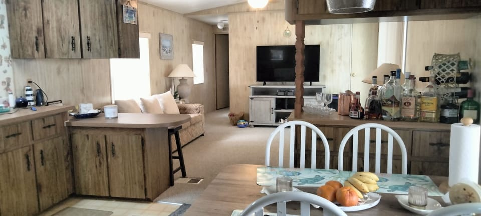 View from laundry to the Kitchen ,Dining and living room.