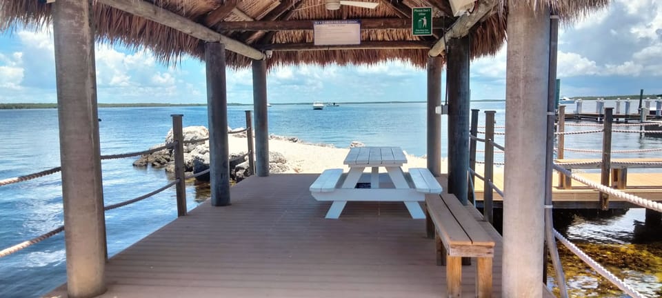 Tiki Hut and boat ramp, only three blocks front the property.