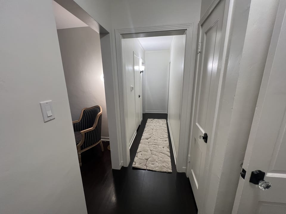 Hallway leading from front of house leading to back of house