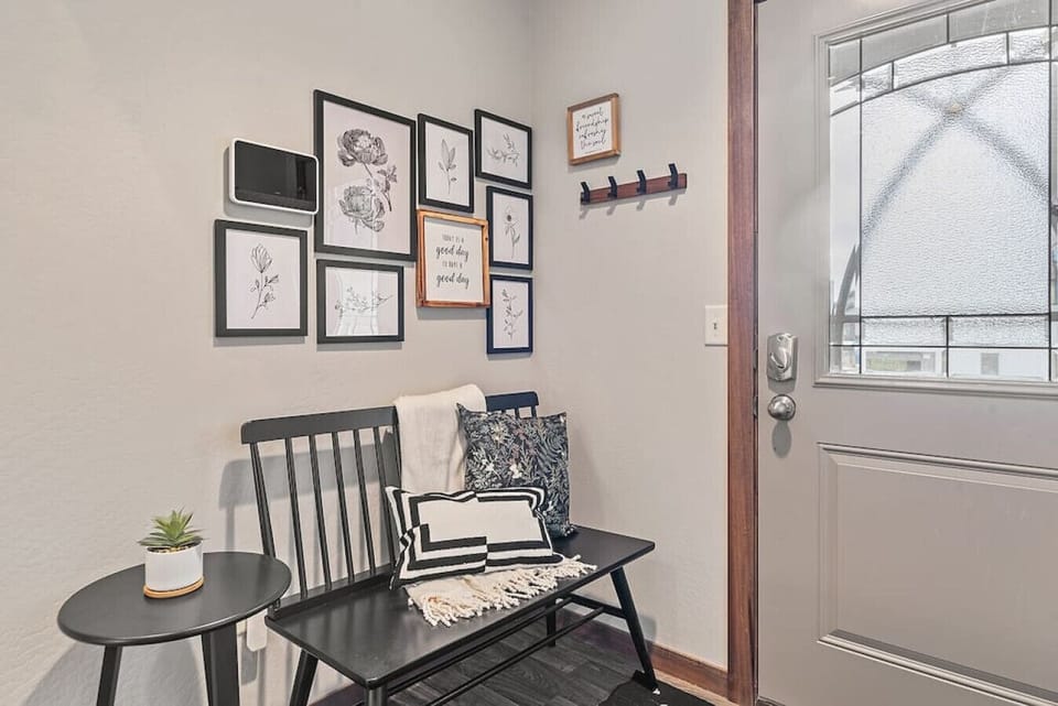 Welcoming entryway adorned with tasteful decorations, setting the tone for an inviting and well-designed home.
