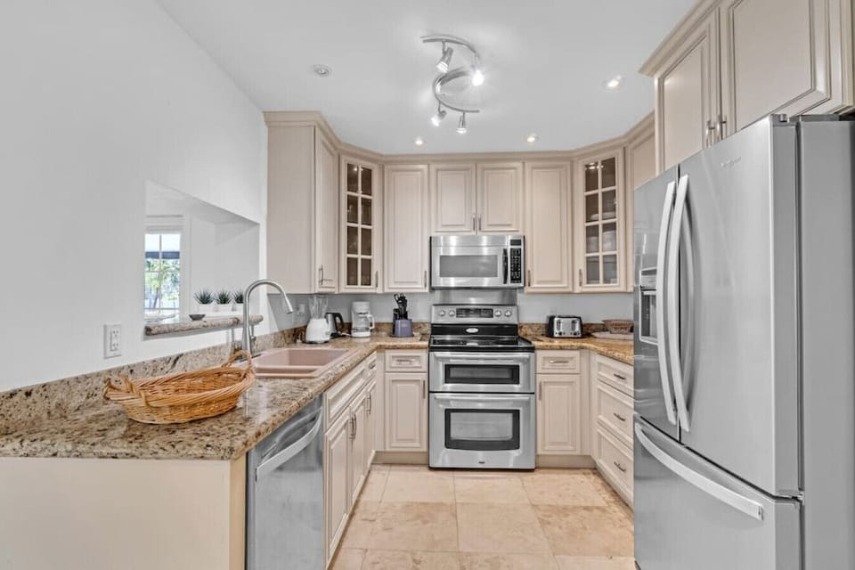 Complete modern kitchen amenities to use.
