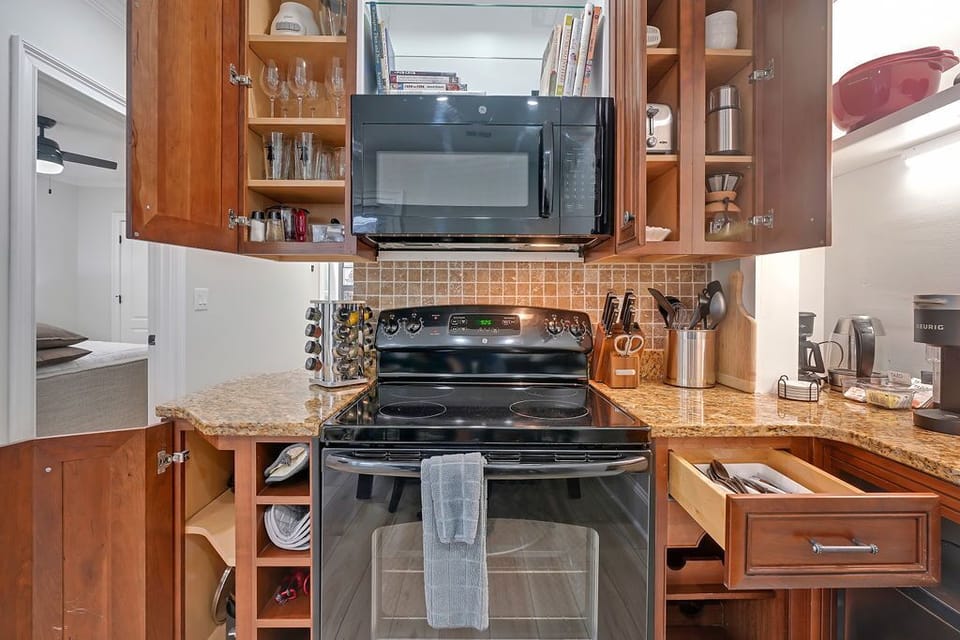Fully equipped kitchen with user friendly appliances.