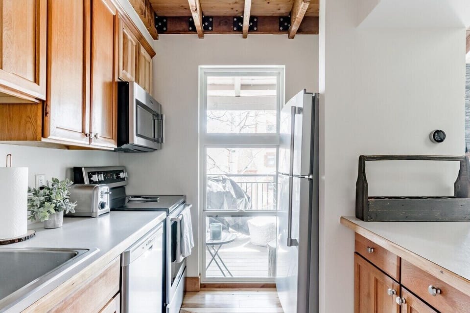 Well stocked kitchen includes coffee maker and all the essentials to enjoy meals