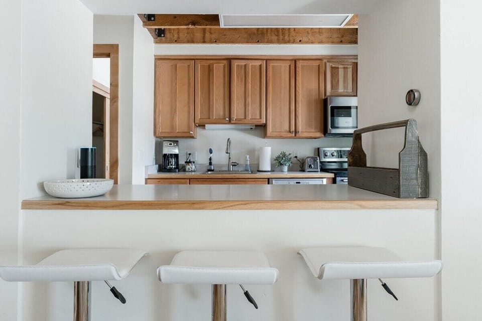 Well stocked kitchen includes coffee maker and all the essentials to enjoy meals